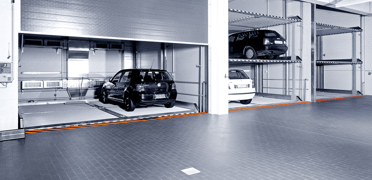 Stack parking in garage with three cars